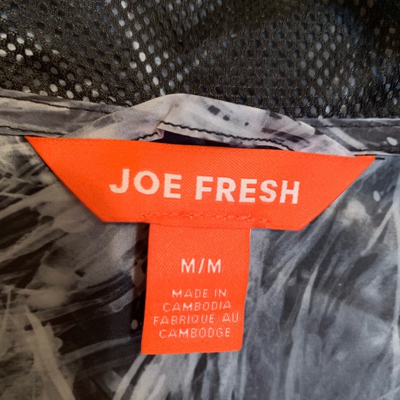 Black and white rain coat - Picture 3 of 3